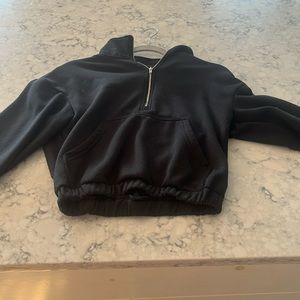 Black sweater zip up.